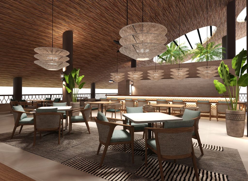 Restaurant Pilipili im JAZ Elite Aurora mit Holztischen, blauen Stuhlpolstern, Hängelampen und Oberlicht mit Palmenblick